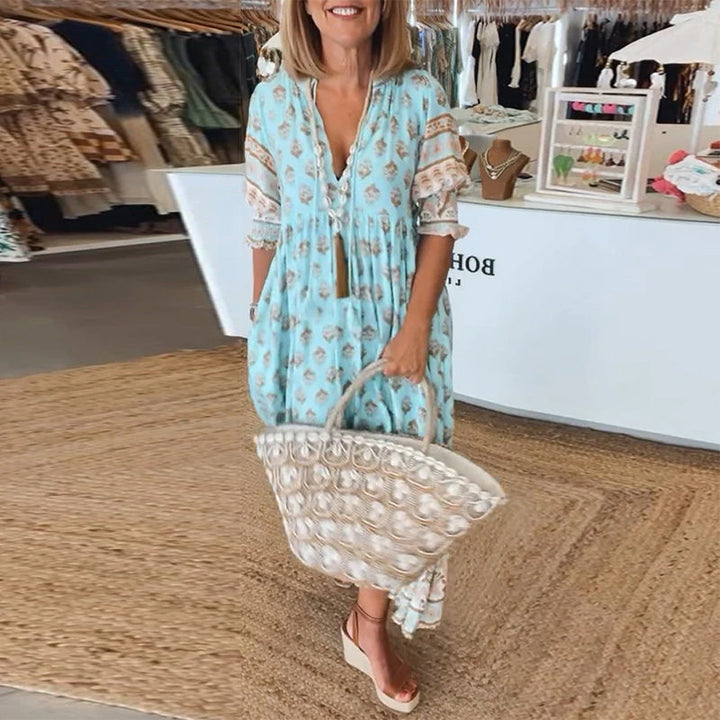 Cherry | Patterned midi dress with V-neck and balloon sleeves Elegant