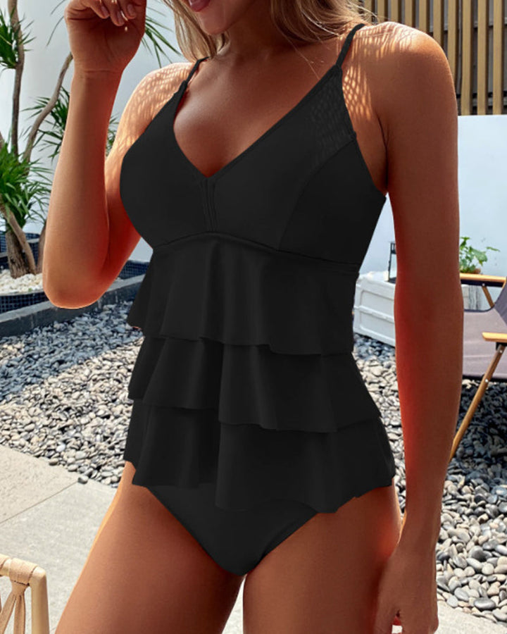 Gwen | Plain coloured swimsuit with decorative ruffles